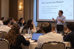 Summer 2025 economics seminar lecture with participants